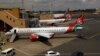 Pesawat milik maskapai Kenya Airways terlihat berada di Bandara Insternasional Jomo Kenyatta di Nairobi, Kenya, pada 1 Agustus 2020. (Foto: Reuters/Njeri Mwangi)